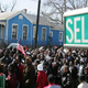 A large crowd marches down the streets of Selma, Ala., in 2007 while re-creating a peaceful voting-rights march that was violently repressed by Alabama troopers in 1965.
ROBERTO SCHMIDT/AFP/Getty Images